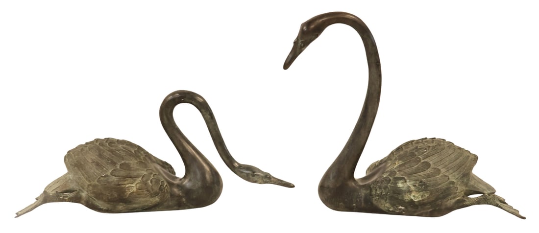 Large & Impressive Pair of Bronze Swans.: Very well executed and nice large size. Apparently unsigned. From a Harrison NY estate. Dimensions: swans measure approx. 23" h x 28" w x 10" d & 14" h x 34" w x 10" d.