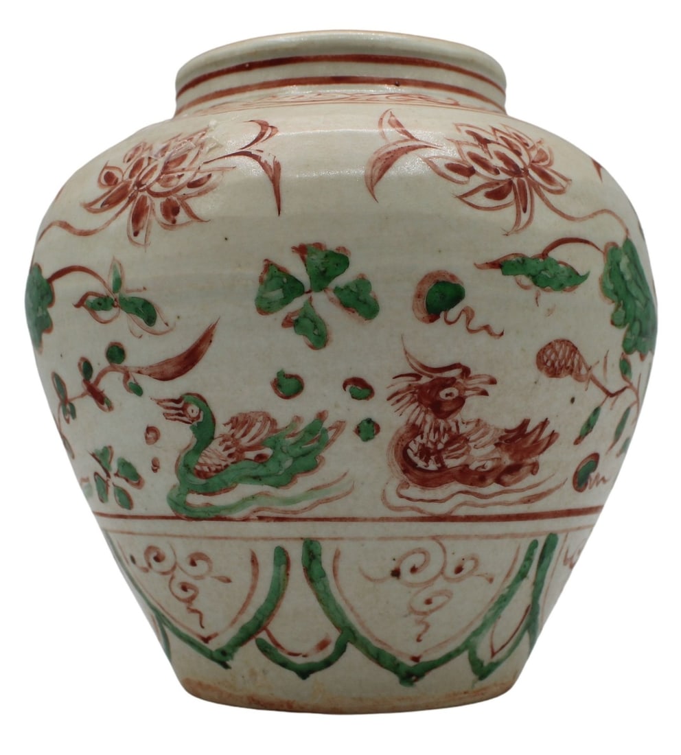 Chinese Ming Dynasty (?) Iron Red and Green: Porcelain Pot. Chinese pot is decorated with foliage, phoenixes & swans. Petal and ribbon accent designs. From a White Plains, NY estate. Dimensions: iron red pot measures approx. 15" in circumference