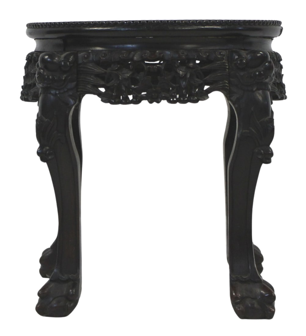 Chinese Carved Wood Marble Top Table.: Chinese marble top carved wood table with foo dog decoration. Foo dog claw form legs & feet. Dark red marble center. Decor panels made separately and attached later. From a Manhattan, NY estate. Dimen