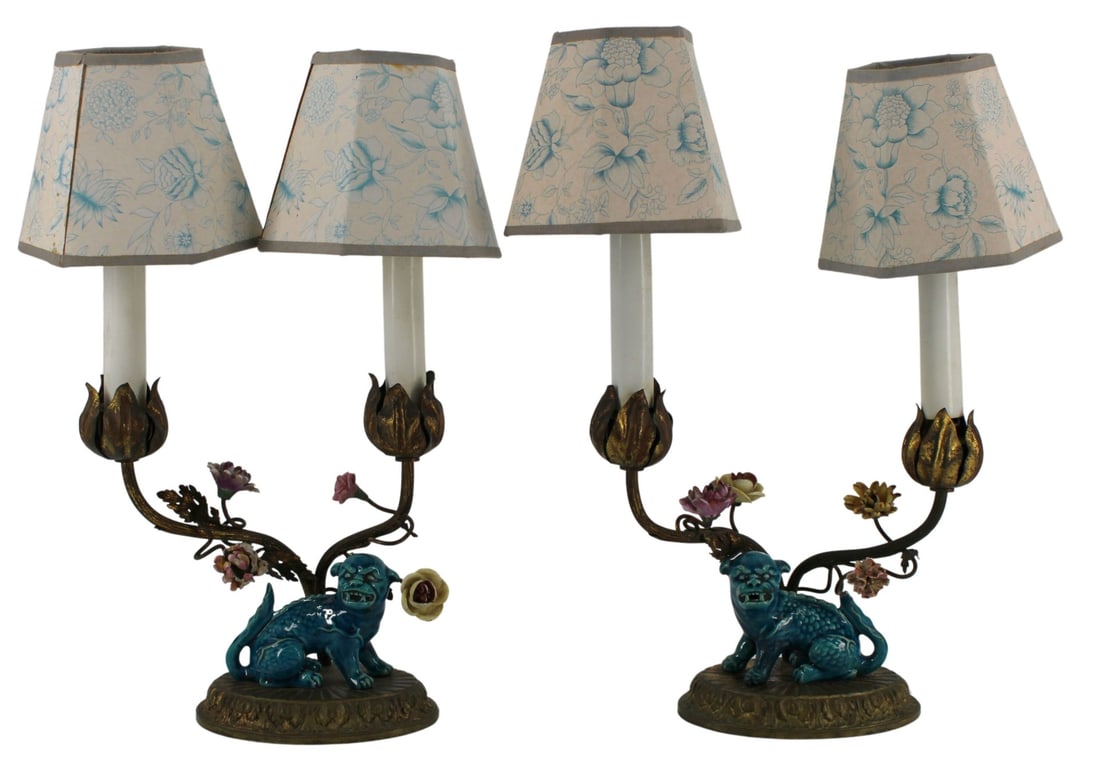 Pair of Chinese Turquoise Glaze Foo Lions as Lamps: Pair of lamps displaying Chinese turquoise blue glazed ceramic foo dogs on floral decorated metal bases. "Made in France" stamped into the underside of each. From a Queens, NY estate. Dimensions: appr