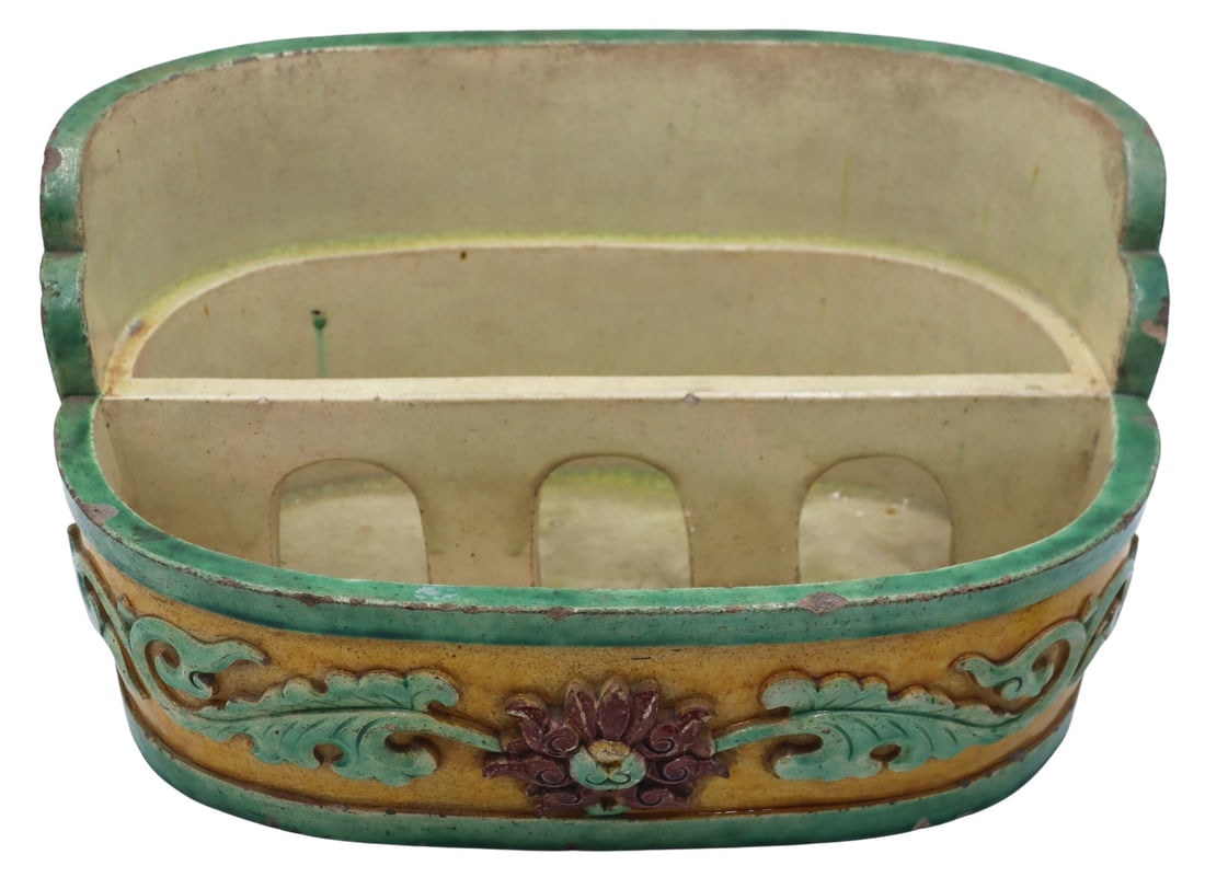 Chinese Green Yellow and Aubergine Glaze Planter.: Chinese green, yellow and aubergine glazed planter with applied high relief chrysanthemum with scrolling leaves. With two partial/illegible paper labels verso. From a Westchester, NY estate. Dimension