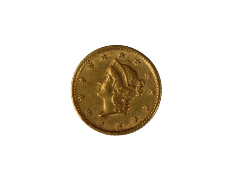 NUMISMATICS. 1853 $1 Liberty Head Gold Coin: An 1853 (Philadelphia struck) $1 Liberty Head Gold Coin, struck in .900 gold. The total mintage for this date & mint: 4,076,051.Total approx. weight is 1.70 grams (gross). From a Bronxville, NY estate