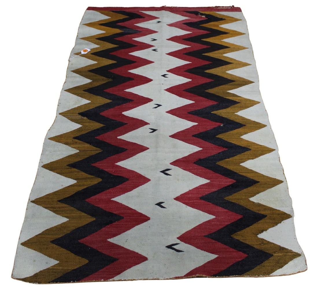 Navajo Rug Carpet.: An antique Navajo carpet. With wear, soiling, holes, repairs, sun fade, etc. From a NY, NY estate. - Dimensions: 4ft 3" x 7ft 9"