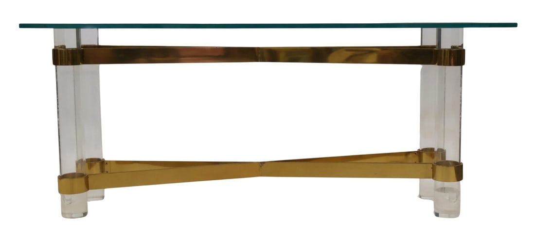 AFTER Karl Springer Brass & Lucite Console Table.: Console table thick Lucite legs, x-shaped brass stretchers and a thick glass top. Unmarked. From a New York City estate. - Dimensions: 32" h x 72.75" w x 20" d