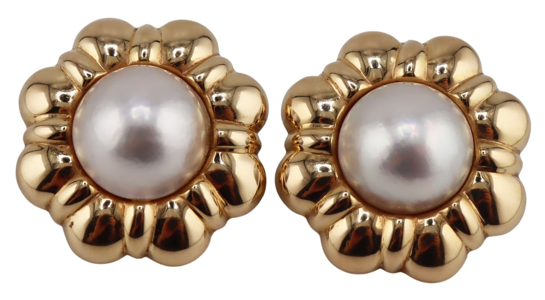 JEWELRY. Pair of 14kt Gold and Mabe Pearl Earrings: Pair of 14kt yellow gold floral form earrings with central circular mabe pearl earrings. Stamped, "ANF 14K". Total approx. weight of the pair of earrings is 11.7 dwt (gross). From a Rye Brook, NY esta