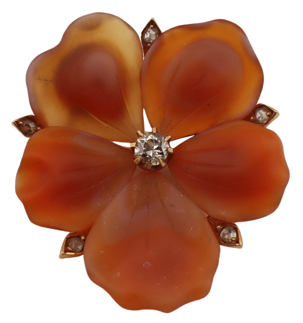 JEWELRY. 18kt Gold, Carnelian and Diamond Brooch.: Antique 18kt yellow gold floral form brooch comprised of (5) beautifully carved Carnelian petals accented by rose cut diamond accents and a central prong-set Old European cut diamond. Central diamond 