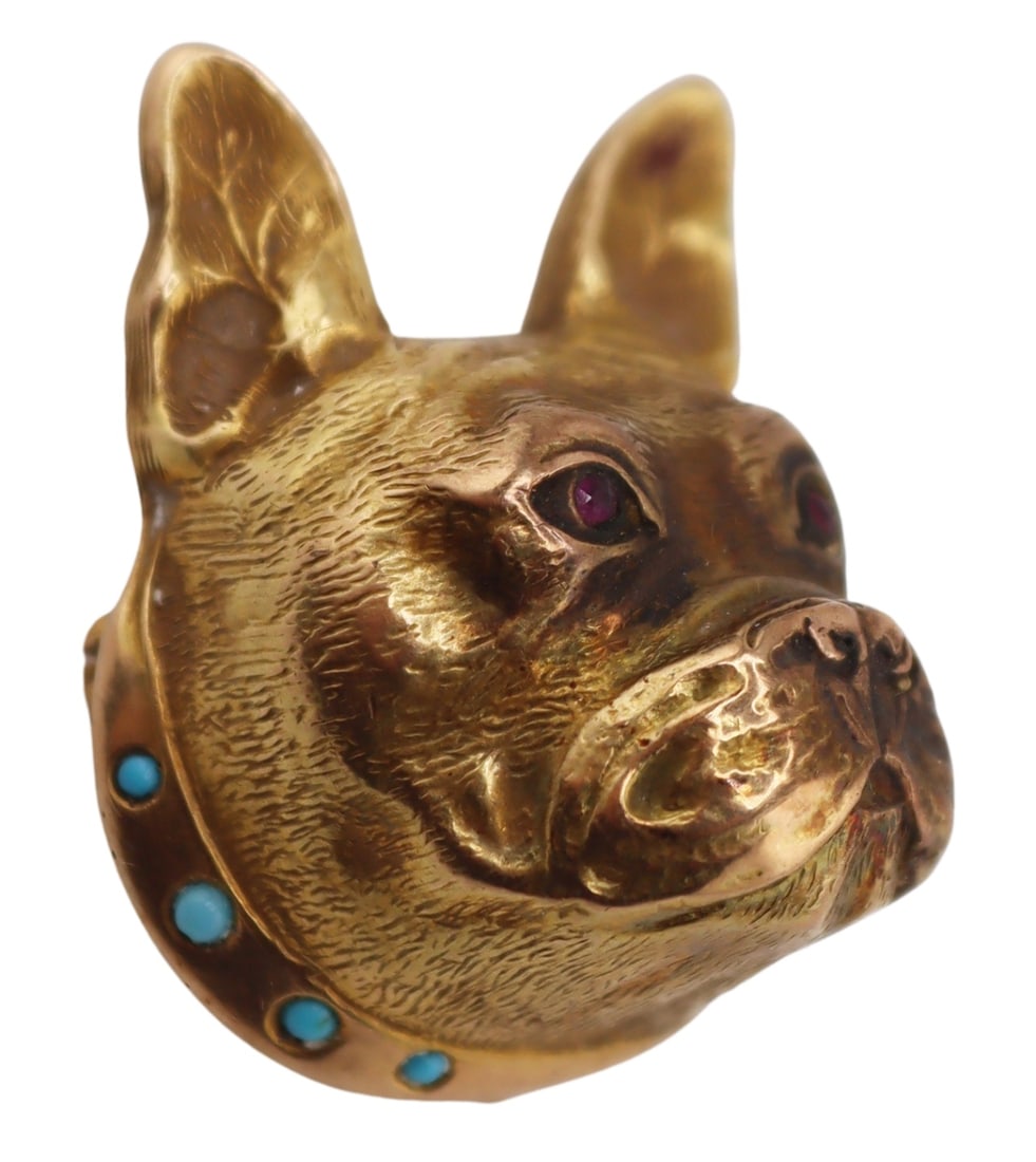 JEWELRY. Signed 14kt Gold, Ruby and Turquoise Dog: Brooch. Signed 14kt yellow gold French Bulldog head form brooch accented by (2) round faceted ruby eyes, and (4) turquoise beads to the collar. Stamped verso, "14" set within a, "G". Total approx. wei