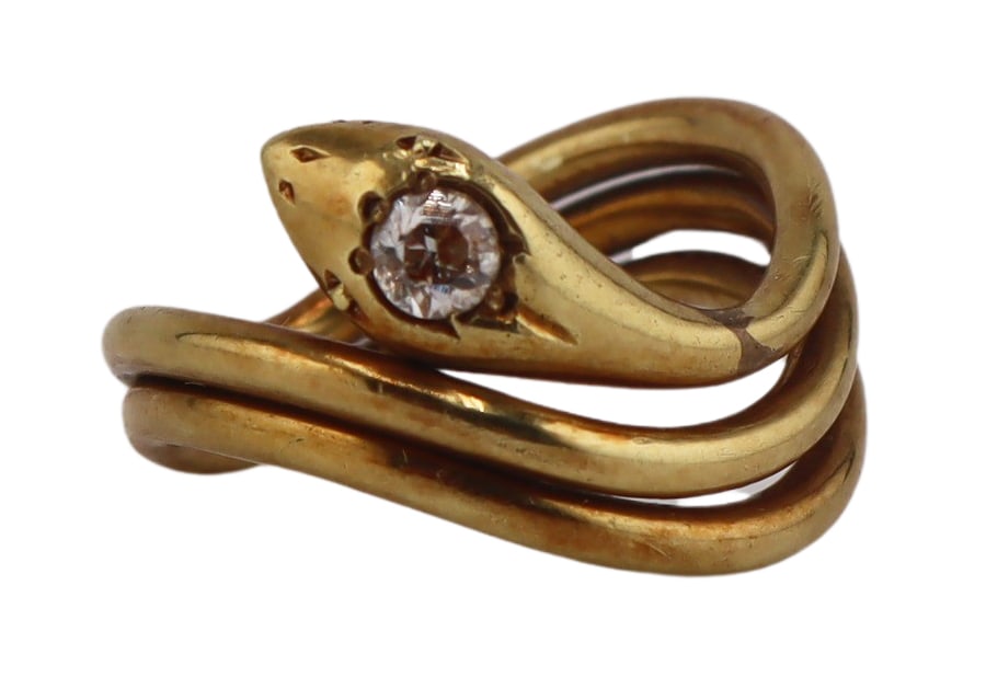 JEWELRY. Antique 17kt Gold and Diamond Snake Ring.: Antique 17kt yellow gold ring in the form of a multi-band coiled snake ring accented by an Old European cut diamond to the head, and displaying a row of jagged teeth to slightly open mouth. Diamond me