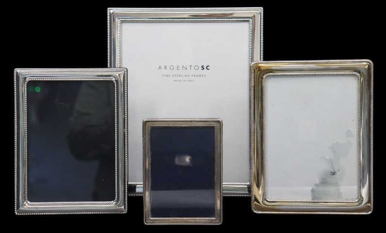 STERLING. (4) Assorted Sterling Picture Frames.: (4) assorted sterling mounted easel back picture frames. Including an 8" x 10" frame; a 5" x 7" frame; a 4.75" x 6.75" frame; and a 3.50" x 5" frame. From a Monsey, NY estate.