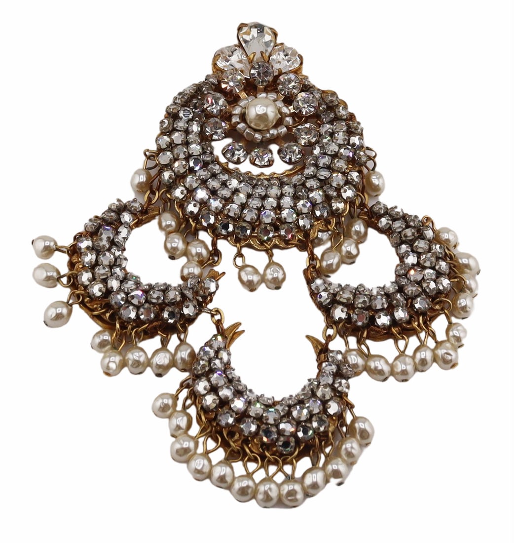 JEWELRY. Attr. Millie Petronzio for Miriam Haskell: Brooch. Signed, "Miriram Haskell" on an applied oval pendant verso. One similar example found states that it was designed and purchased from Millie Petronzio, circa 1996. From a Bronx, NY estate.