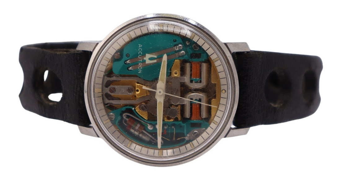 JEWELRY. Bulova Accutron Spaceview Watch.: A vintage 1972 Bulova Accutron Spaceview wristwatch, featuring the signature exposed tuning-fork movement and stainless steel case. The watch is fitted with an Accutron leather rally strap and an