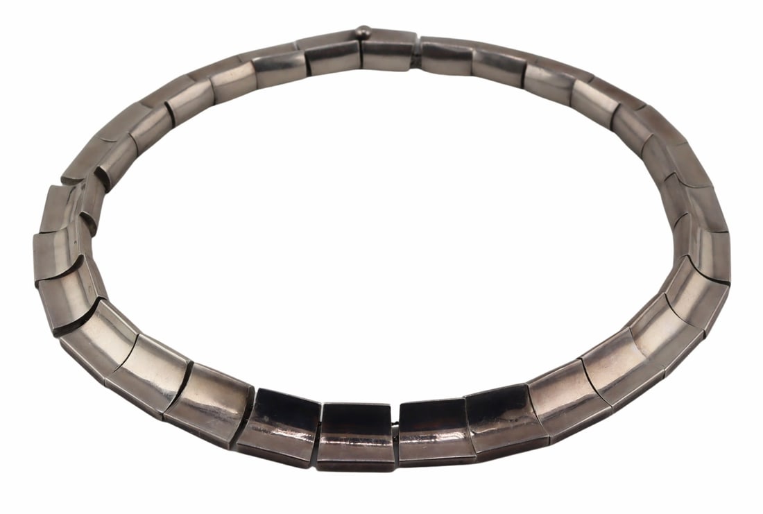 JEWELRY. Antonio Pineda .970 Silver Necklace.: Signed Antonio Pineda .970 silver modernist necklace comprised of curved links with (2) interior silver chains. Stamped, "Sterling Mexico Silver 970" alongside the maker's mark of Antonio Pineda, and 