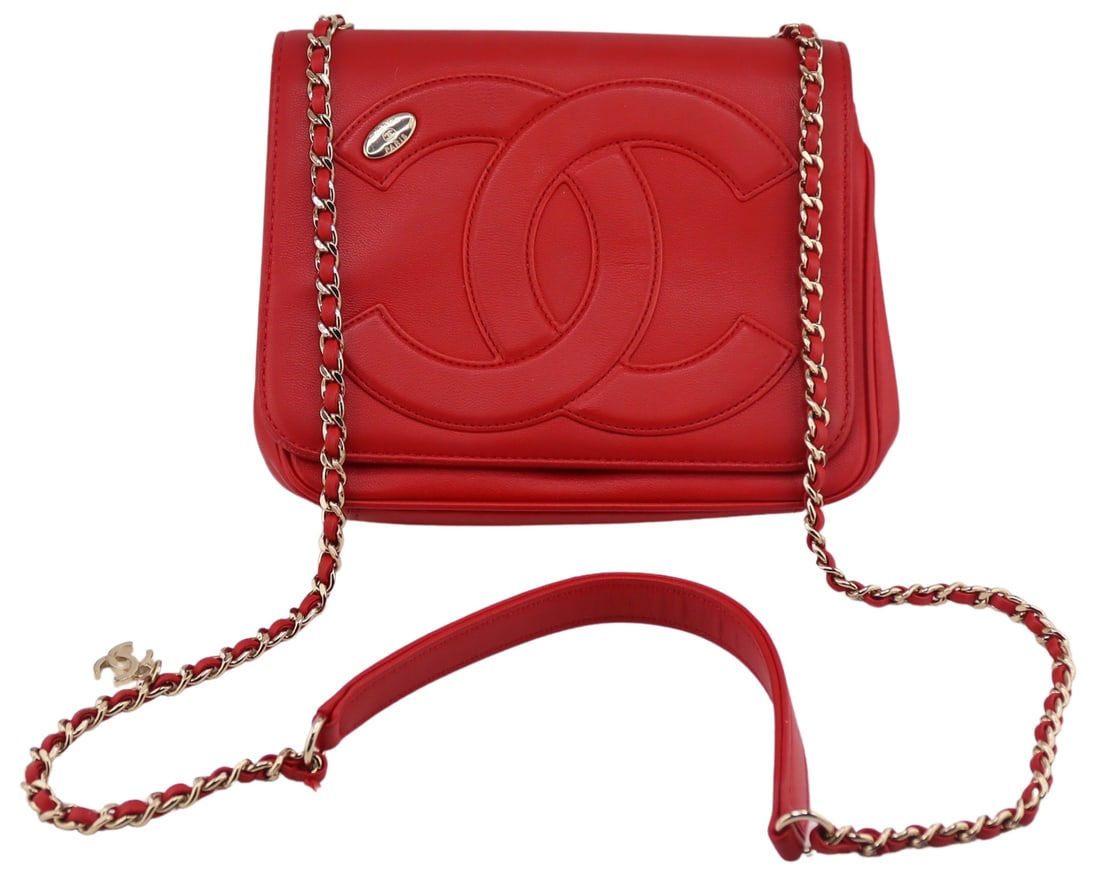 COUTURE. Chanel Red Lambskin Mania Flap: Crossbody Bag or Purse. Chanel red lambskin mania flap crossbody purse with front flap magnetic closure, and leather woven chain strap with leather shoulder guard. Displays an interior zippered