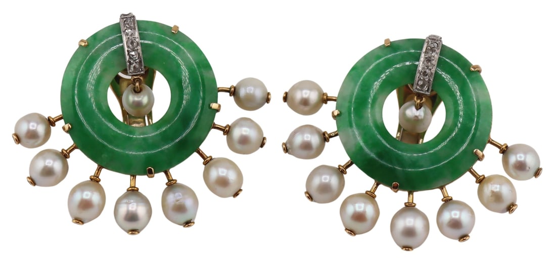 JEWELRY. Pair of 14kt Gold Pearl Jade and Diamond: Earrings. Includes a pair of 14kt yellow gold statement earrings comprised of a openwork circular polished jade pendants accented by a spray of (8) 14kt yellow gold mounted pearls and a central rose