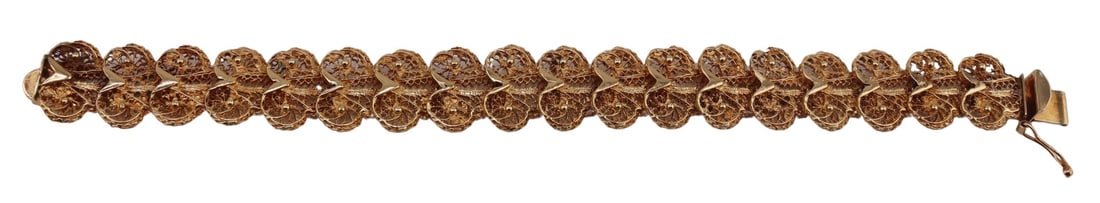 JEWELRY. 14kt Gold Filigree Link Bracelet.: Vintage 14kt yellow gold filigree link articulated bracelet. Stamped, "14K". Total approx. weight of the bracelet is 14.3 dwt (gross). From a Larchmont, NY estate. Dimensions: bracelet measures