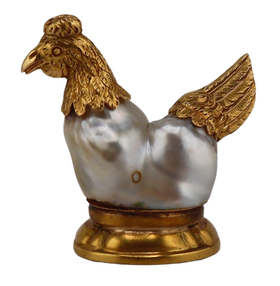 JEWELRY. Antique Gold Mounted Baroque Pearl: Rooster Fob Seal Pendant. Antique 18kt yellow gold mounted rooster form fob seal pendant with large baroque pearl body and beautifully detailed feathers. With an oval Carnelian pendant to the undersid