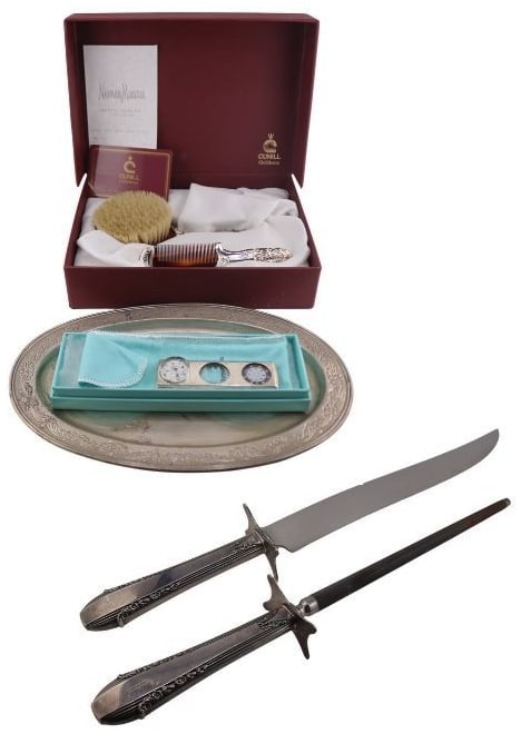 SILVER. Collection of Silver Objects Inc. Tiffany.: Includes a Hazorfim sterling oval tray with etched scroll border - stamped, "Hazorfim 925S"; a 2 pc. carving set with sterling handles; a Tiffany & Co. sterling multi-tool object including a ruler, ma