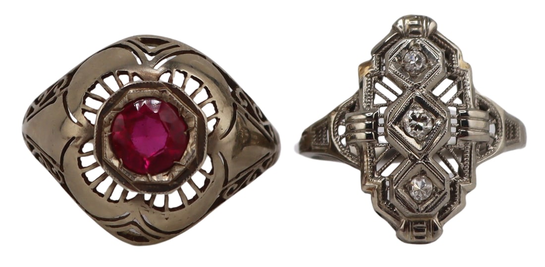 JEWELRY. (2) Antique Filigree Gold Rings.: Includes an Art Deco 17.5kt white gold filigree cocktail ring displaying (3) stacked round faceted diamonds - stamped, "18K"; and a 12.5kt white gold dome form cocktail ring with central round faceted