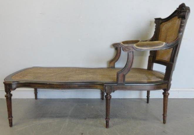 Louis XV Style Carved and Caned Chaise.: From a Greenwich, CT home. Dimensions: 26.5" wide x 62" deep x 43" high.