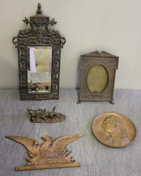Lot of Bronzes and Frames.: Includes a bronze figural of Satyr and Nymph, a WWI aviation frame, a mirror with dolphin motif, an eagle crest, and a "Leo Nock" plaque of George Washington. From a Rye, NY home. Dimensions: dolphin 