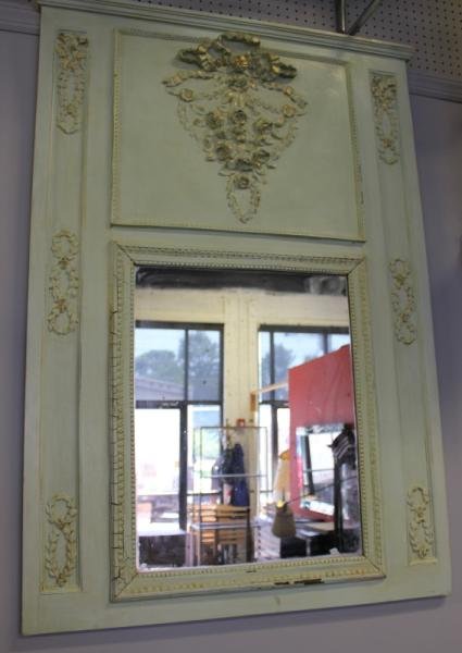 Two Antique French Trumeau Mirrors.: Includes one mirror with deeply carved garlands of flowers, with old if not original glass. And one mirror with carved interlaced side flowers and deeply carved bow knotted central festoon of flowers,