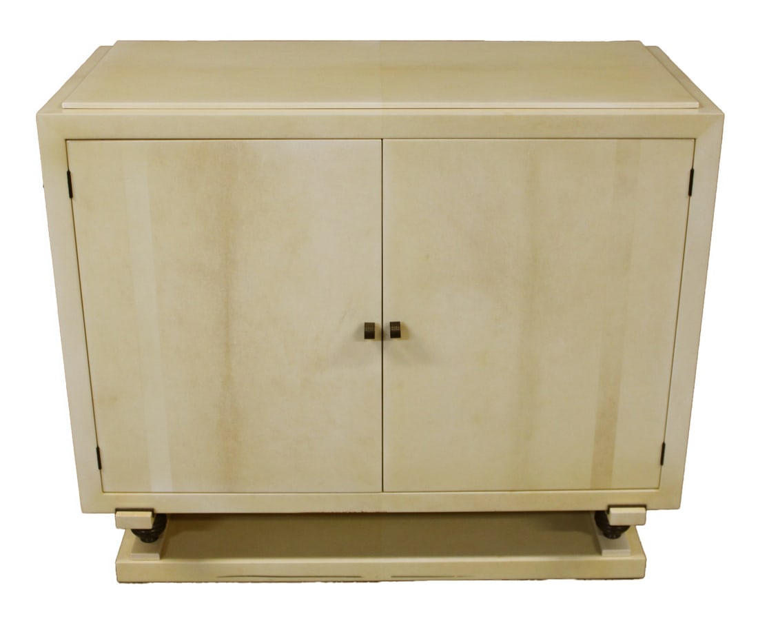 Midcentury Parchment / Goatskin 2 Door Cabinet.: Midcentury goatskin parchment two door cabinet with bronze pulls and bronze ball feet. From the estate of a 50+ year antique dealer specializing in decorative arts with an emphasis on Opaline glass bo