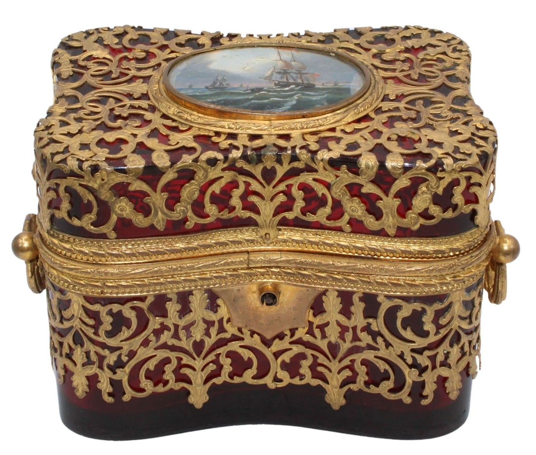Antique Gilt Bronze Mounted Cranberry Glass Box.: Decorated with nautical reverse painting of a ship at sea. The box has ornate gilt bronze overlay and mounts, with small handles on each side. From the estate of a 50+ year antique dealer specializing