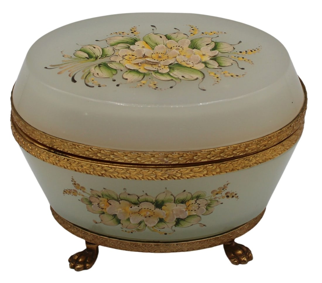 French Oval Opalescent Glass Box of Floral Motif.: Decorated with carved design and bronze mounts. Circa 1930's. Opalescent glass box is decorated with a raised floral motif with bronze claw foot form feet. From the estate of a 50+ year antique dealer