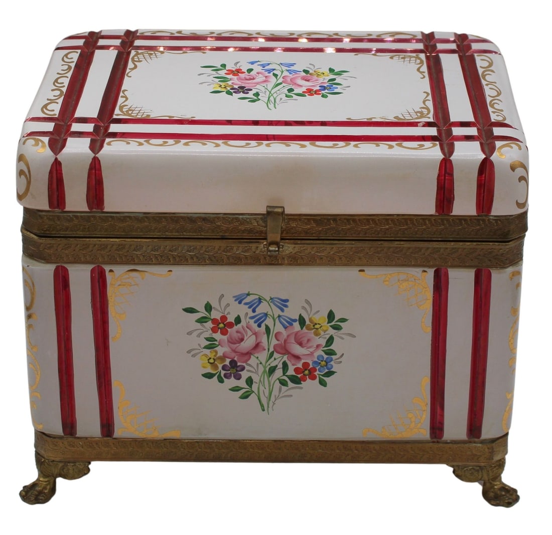 Unusual 19th C Bohemian White Opaline Box with Red: Cuts. Bronze mounts and claw form feet with gilded decoration and enamel floral motif. Flowers vary in size, color, and species. Bronze mounts engraved with leaf pattern. From the estate of a 50+ year
