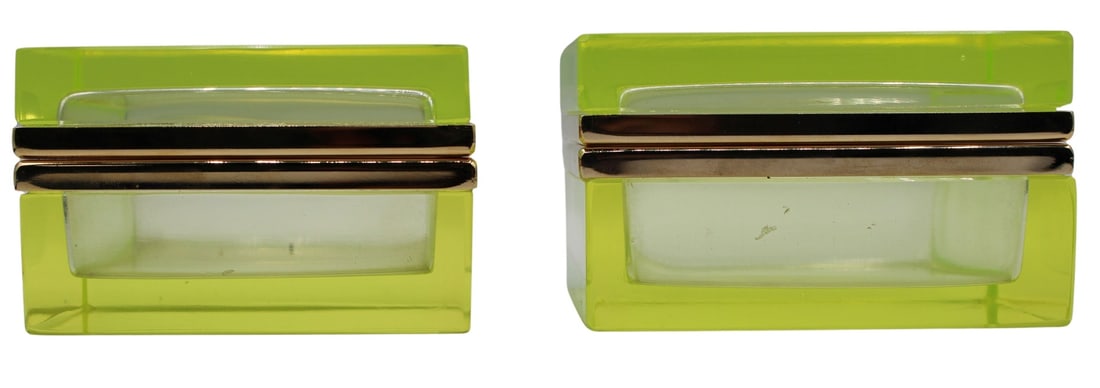 (2) Uranium Glass and Gilt Metal Vanity Boxes.: Includes a uranium glass neon yellow Murano glass box with gilt metal mounts; and a smaller uranium glass box with gilt metal mounts. Both boxes glow under ultra violet light. From the estate of a 50+