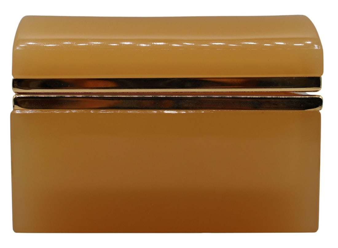 French Butterscotch Trunk Form Opaline Glass Box.: French butterscotch colored opaline glass trunk form box with brass mounts. Circa 1970's. From the estate of a 50+ year antique dealer specializing in decorative arts with an emphasis on opaline glass