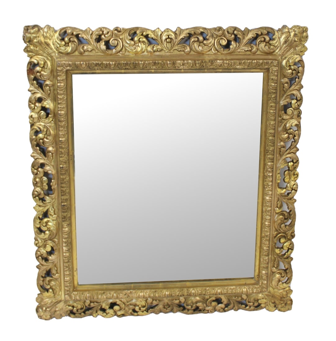 Antique Finely Carved Giltwood Fame as a Mirror.: Great gilt patina and nicely carved. From the estate of a 50+ year antique dealer specializing in decorative arts with an emphasis on Opaline glass boxes. - Dimensions: 34.5" h x 30.5" w.