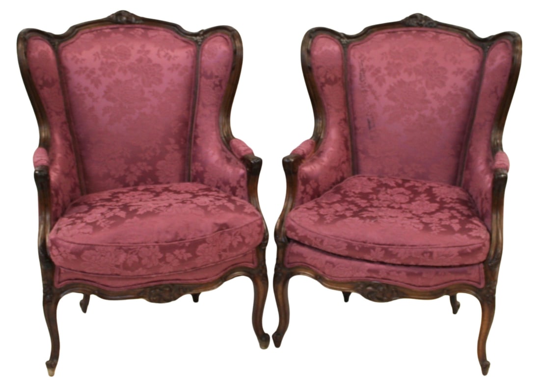 Antique Pair of Upholstered Louis XV Style Wing: Back Chairs. A great looking pair, finely carved, comfy and with great vintage upholstery. From the estate of a 50+ year antique dealer specializing in decorative arts with an emphasis on Opaline glas
