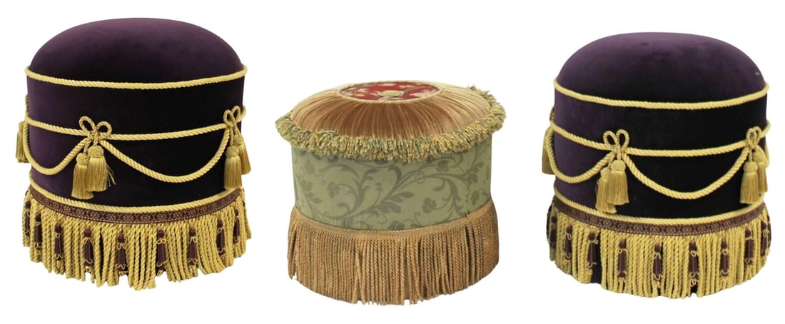 (3) Art Deco Style Upholstered Poufs or Ottomans.: Includes a pair of purple poufs with gilt ribbon and tassels, and a single light green pouf with tassels. From the estate of a 50+ year antique dealer specializing in decorative arts with an emphasis 