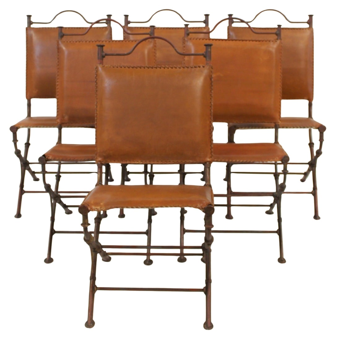 (6 Vintage Patinated Metal Savonarola Style Chairs: with Leather Upholstery. A great set, heavy with strong brown leather upholstery. From the estate of a 50+ year antique dealer specializing in decorative arts with an emphasis on Opaline glass boxes.