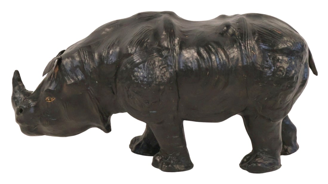 Vintage Leather Rhino after Abercrombie & Fitch.: Well executed. From the estate of a 50+ year antique dealer specializing in decorative arts with an emphasis on Opaline glass boxes. - Dimensions: 13" x 26"