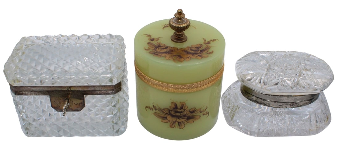 (3) Cut Boxes with Metal Mounts.: Including a cut crystal rare form glass box with gilt-metal mounts; a cut crystal octagonal form box with silvered bronze mounts and lock system; and a yellow/ green opaline glass hinged dress box wit