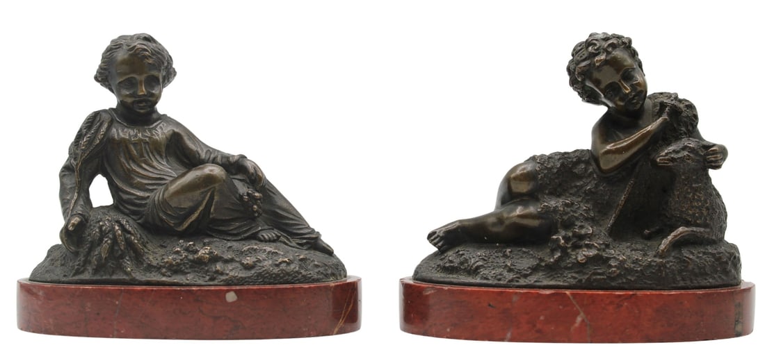 Pr of Bronze Reclining Children on Marble Bases.: One bronze depicts a youth holding a staff laying down outdoors with a lamb in arms - stamped, "A"; "Ton"; and "B" on the underside. The second bronze is of a youth weari