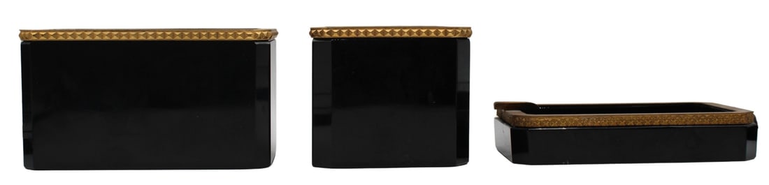 (3) Black Opaline Bronze Mounted Open Glass: Objects. Including (2) open black opaline containers with engraved bronze mounts around the rim of each; and a black opaline ash tray with engraved bronze mounts around the rim. From the estate of a 5