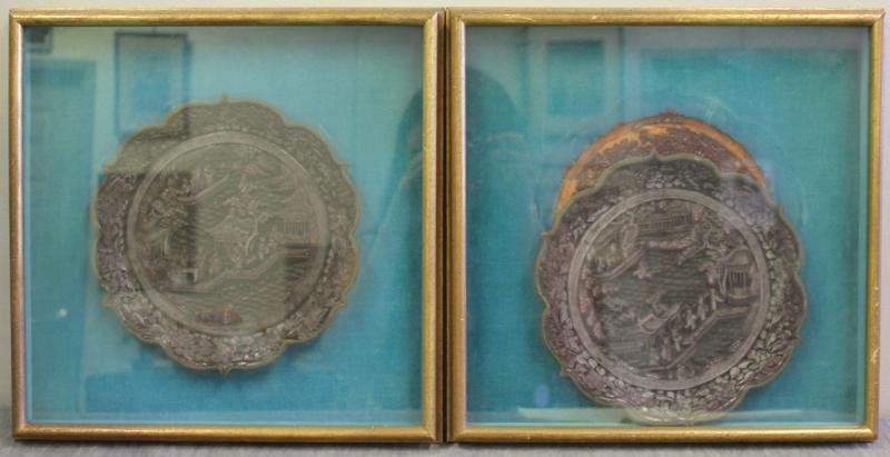 Pair of Antique Cinnabar Plates.: In shadow box style frames. Deep aubergine color. Well and deeply carved. With apparently brass trim. From a Yonkers, NY home. Dimensions: plate diameter is 8.5." Condition: Not examined out of frame,