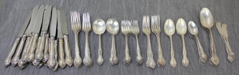 STERLING. Gorham "English Gadroon" Flatware Set.: Includes 3 spread knives, 3 large tablespoons, 5 teaspoons, 5 tablespoons, 8 luncheon forks, 8 salad forks, 7 soup spoons, 7 dinner forks, and 15 knives with stainless steel blades. Total approximate 