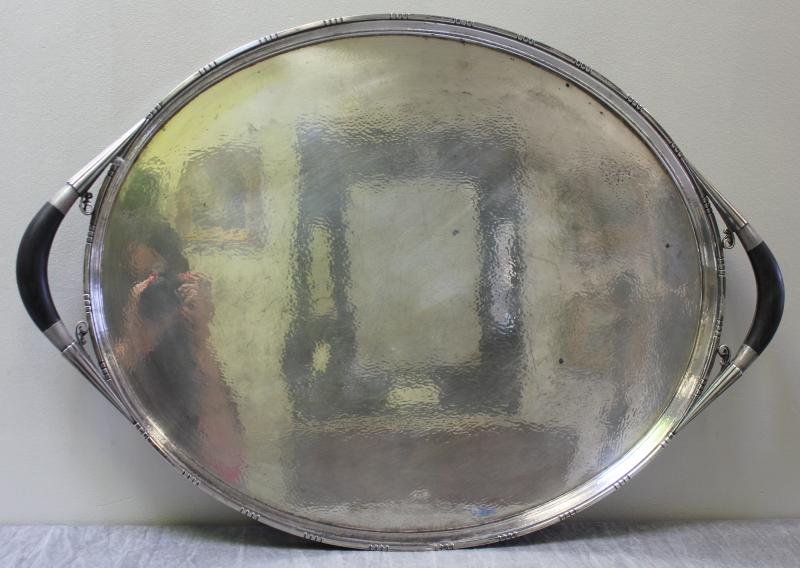 STERLING. Large Vintage Georg Jensen Tray.: Hand hammered finish with ebony handles. #251. Johan Rohde Design, 1856-1935. Total approximate weight is 115.1 troy oz. From a 1254 Fifth Ave NYC estate. Dimensions: 27" in length x 18.875" d x 1.75"