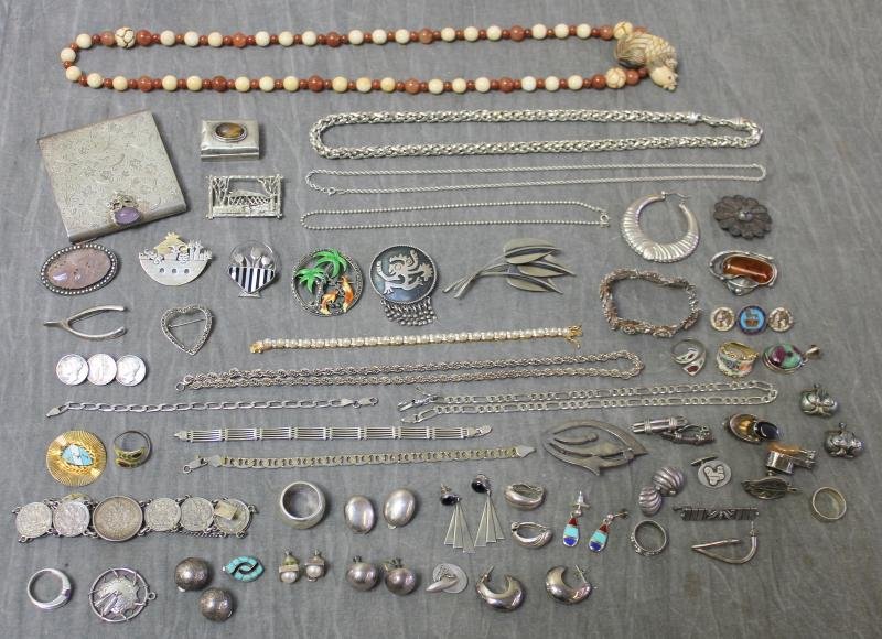 JEWELRY. Miscellaneous Sterling Group.: Includes a beaded necklace with carved bird pendant, an etched .800 silver compact, a Mexican sterling pill box with inlaid tigers eye?, 7 rings, a pair of Taxco 980 cuff links, 4 pendants, 6 bracelet
