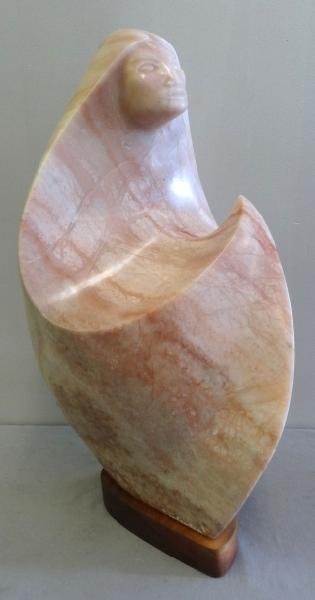 LAFOUNTAIN, Bruce. Carved Marble Native American: Figure. Signed and dated 1984 along lower edge. Mounted on wood base. Bruce LaFountain, Native American - North Dakota, b. 1961. Dimensions: 12" wide x 16" deep x 27" high. Condition: Good.