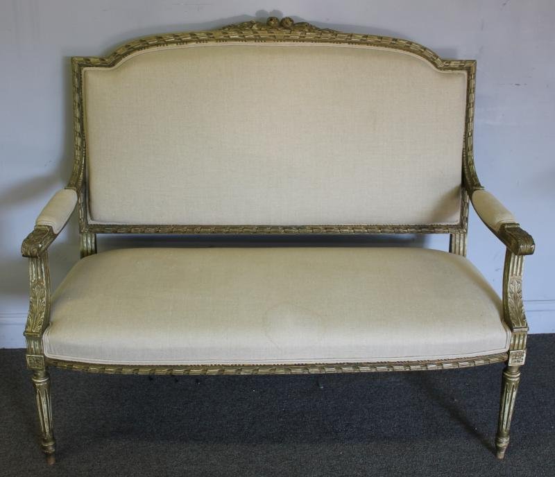 19th Century Louis XVI Style Settee.: Recent linen upholstery. From a Westchester, NY home. Dimensions: 50.675" w x 26.5" d x 44.375" h. Condition: Good.