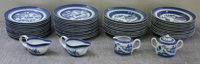 Set of Mattahedeh Vista Alegre Portugal "Blue: Canton" Dinnerware. Includes 24 dinner plates - 10," 20 soup bowls - 10," 2 gravy boats, a creamer and sugar. From a Long Island, NY home. Condition: One soup bowl is chipped; some items with light ho