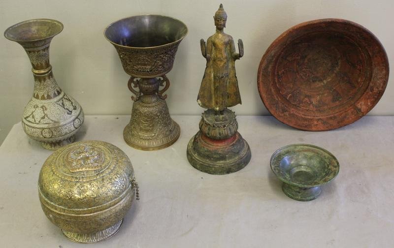 Southeast Asian Lot.: Includes a gilded bronze deity, a ceremonial brass repousse cup with turquoise, a covered brass circular dome box, an Islamic brass vase, a decorated terracotta bowl - probably South American, and a s