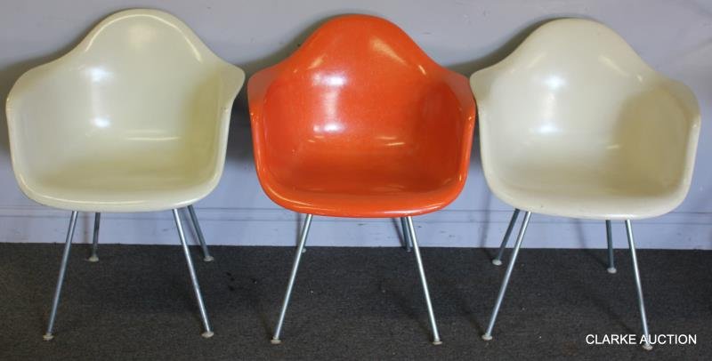 Midcentury Set of 3 Eames Shell Armchairs.: Molded plastic armchairs on steel bases. Designed by Charles and Ray Eames for Herman Miller. Herman Miller label on seat underside. From a Bronx NY Storage . Dimensions: 25" w x 23" d x 32" h. Condit