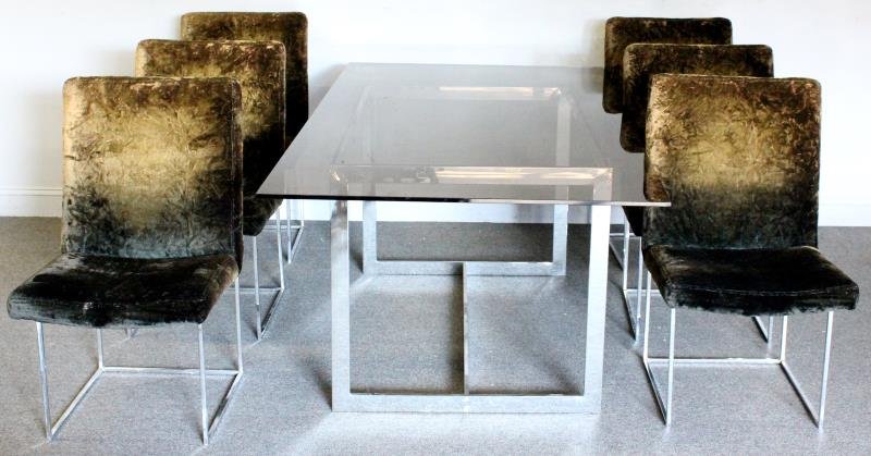 Midcentury Milo Baughman for Thayer Coggin Dining: Set. Includes chrome base dining table with smoke glass top and 6 Milo Baughman chrome and upholstered dining chairs. From a Valhalla, NY estate. Dimensions: Table- Approx. 50" w x 32" d x 29" h; Chai