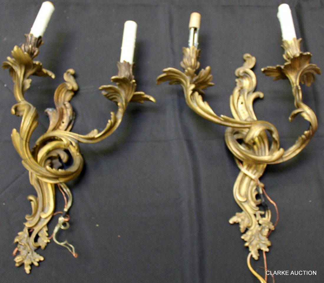 Pair of Signed French Louis XV Style Bronze: Sconces. Stamped with makers name, "L. Viam" and made in France. Nice oak and acorn lower motif. From a Manhattan, NY estate. Dimensions: 13" wide bobeche to bobeche x 17" h.